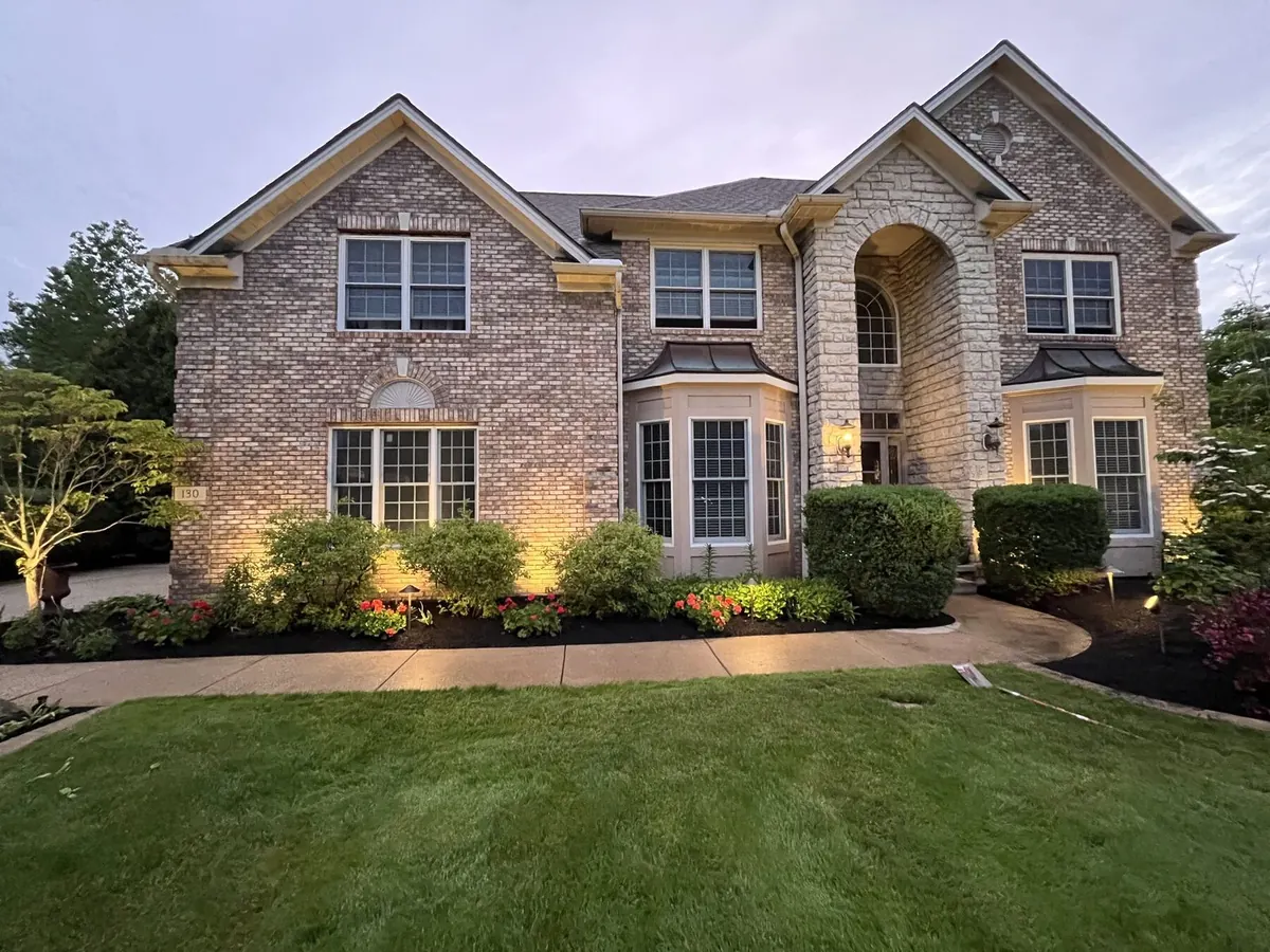 Estate landscape lighting at dusk in Aurora, Ohio