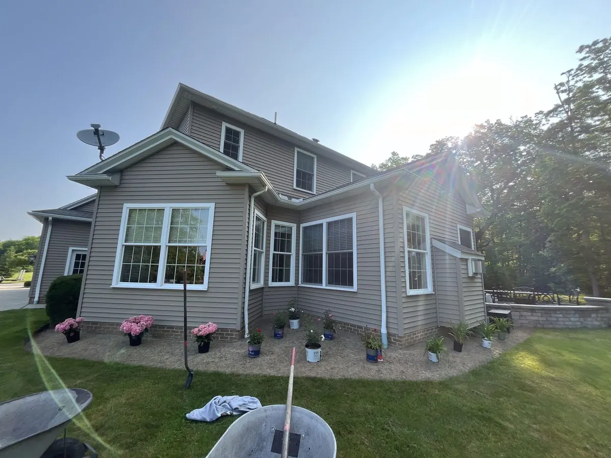 Fresh dark mulch bed installation at a Northeast Ohio property
