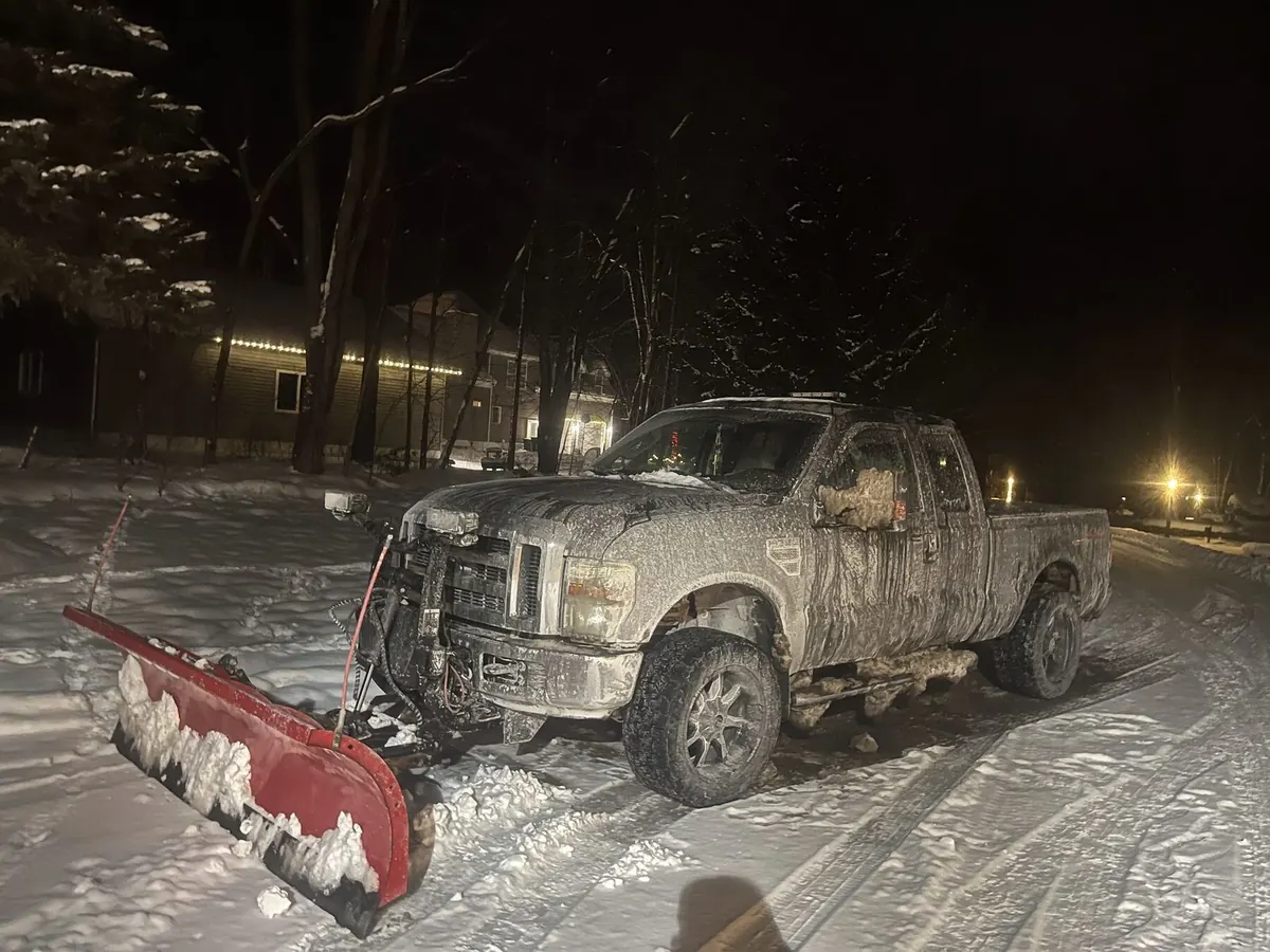 Eagle Scapes plow truck clearing a commercial lot overnight in Aurora, Ohio